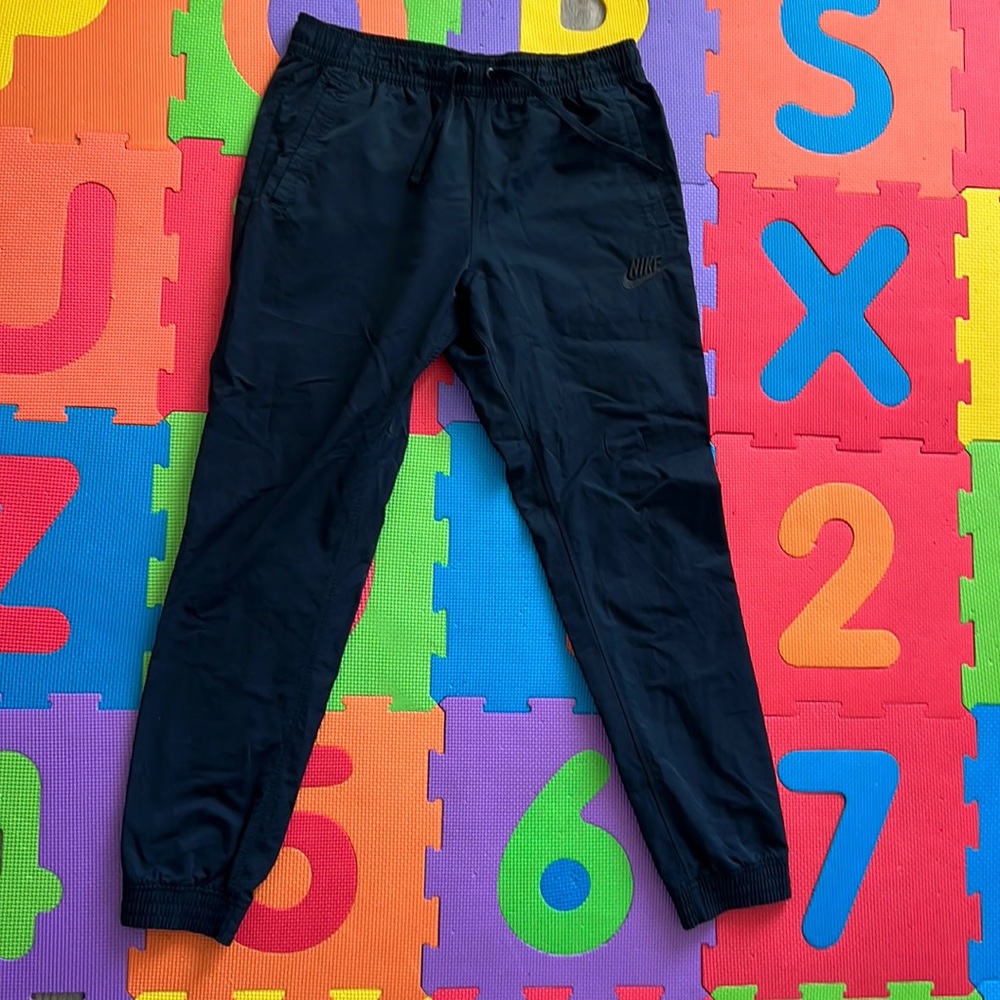 Nike tapered fit pants